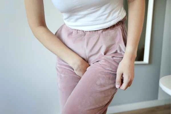 woman struggling with urine incontinence Edinburgh