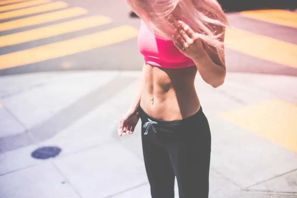 Woman with toned stomach after LA-EMS Body Sculpting Treatment Edinburgh